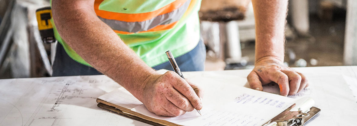 Construction Superintendent signs the log book