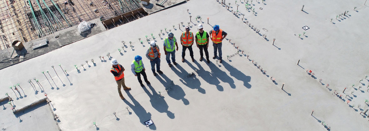 pre-shift safety meeting of workers at construction site